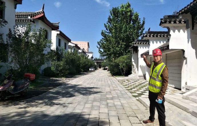 博贏(yíng)建筑維修龍山新新小鎮別墅外墻