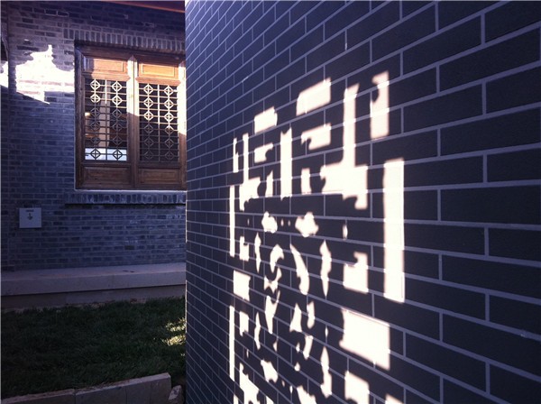 龍山新新小鎮別墅外墻質(zhì)感涂料施工